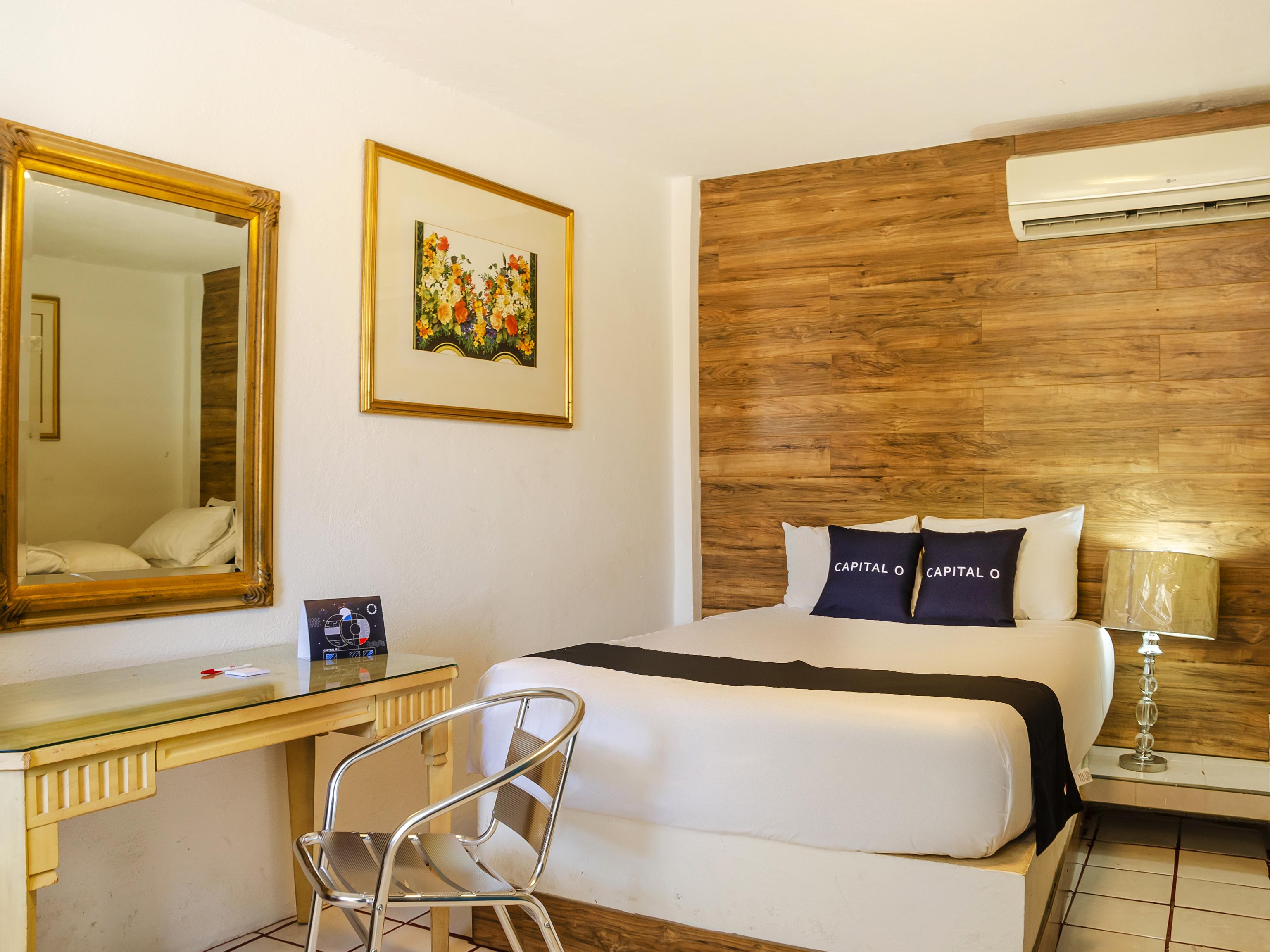 Hotel Capital O Dos Mares,