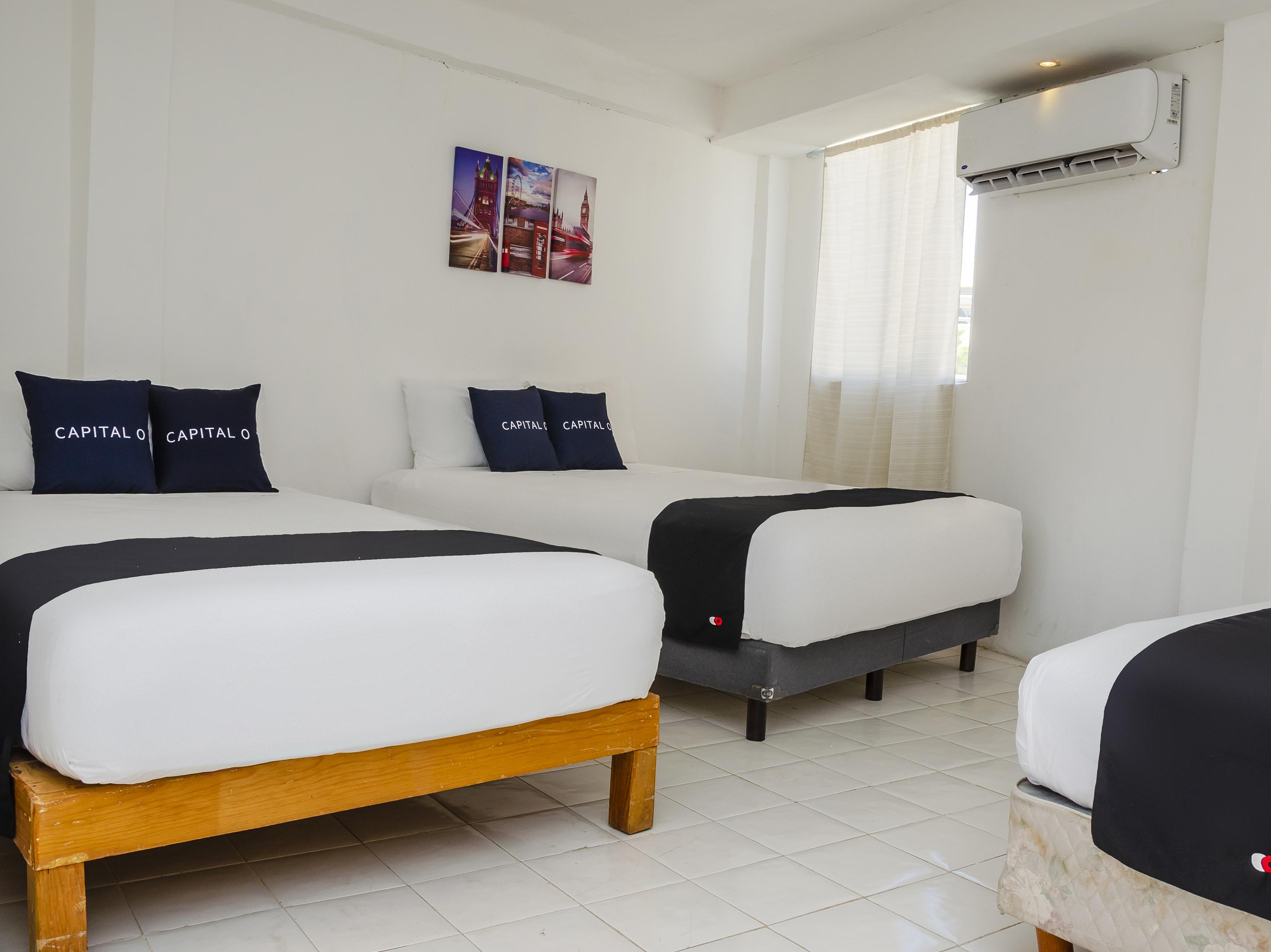 Hotel Capital O Dos Mares,