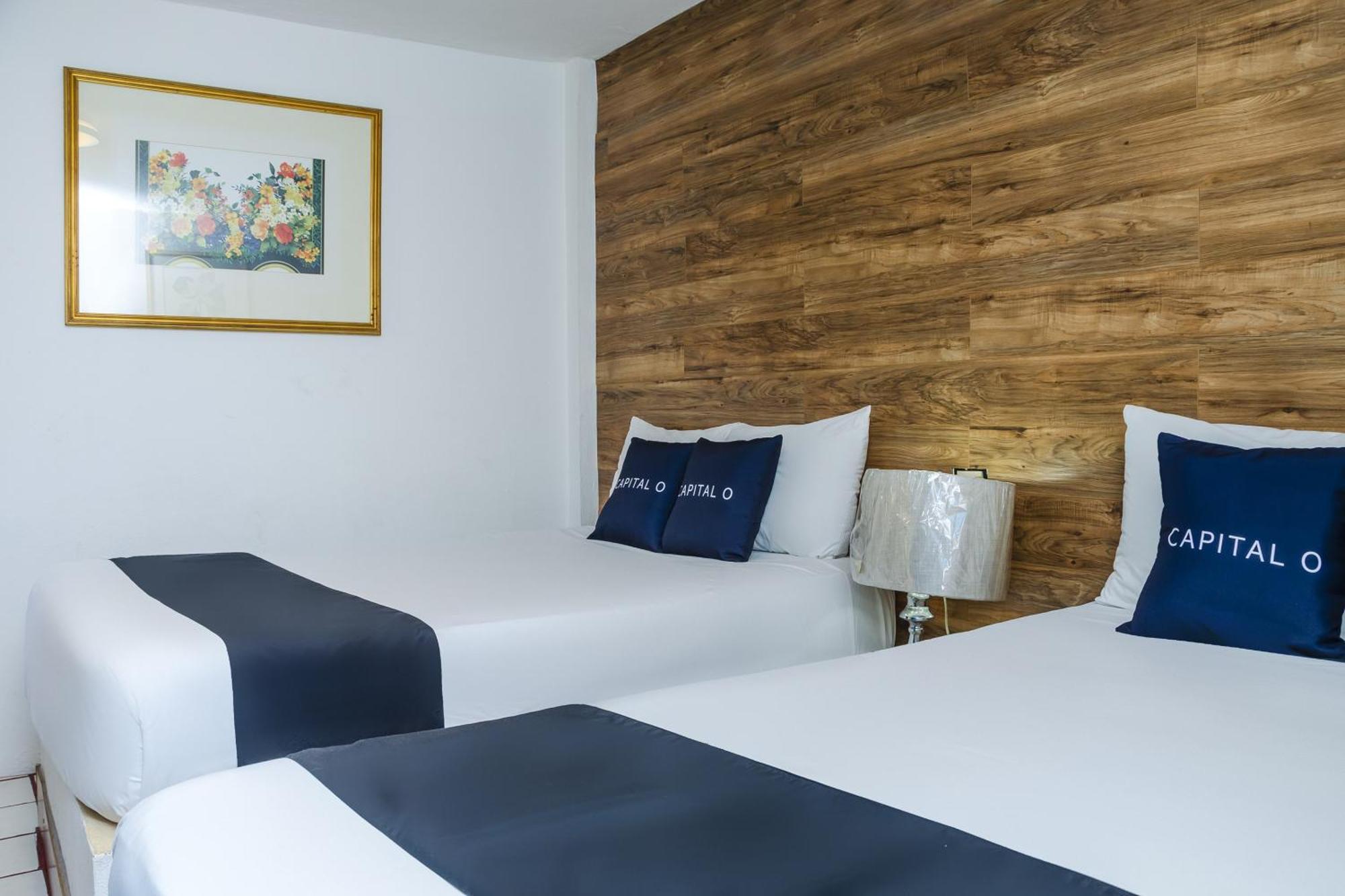 Hotel Capital O Dos Mares,